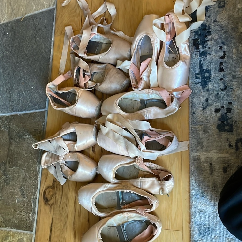 Six pairs used pointe shoes